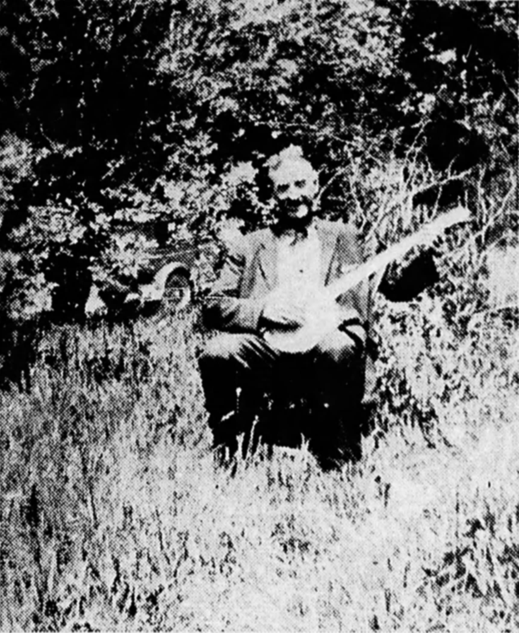 Picture of Doc Hoppes and his banjo.